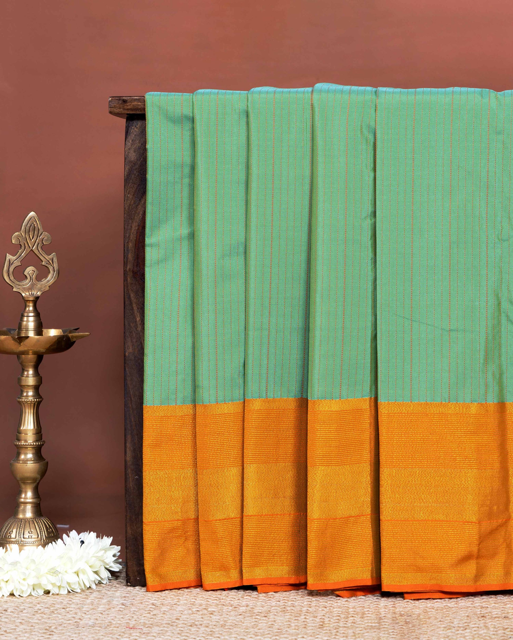 Traditional Soft Silk Saree Adorned with Fine Striped Design and Rich Woven Border - Green