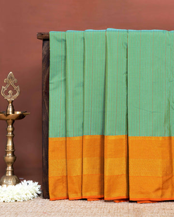 Traditional Soft Silk Saree Adorned with Fine Striped Design and Rich Woven Border - Green