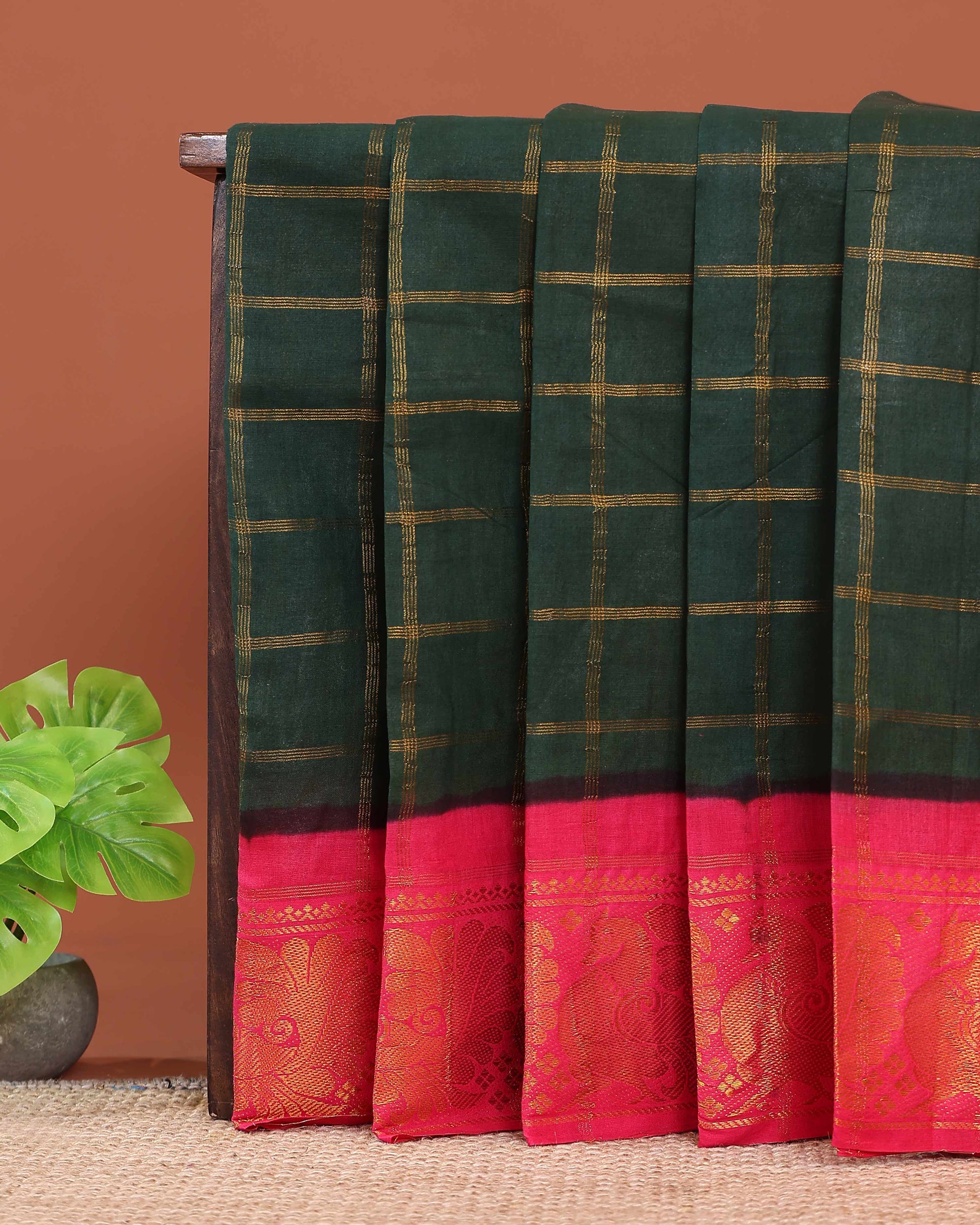 Traditional Sungudi Cotton Saree with Bold Checked Pattern and Intricate Peacock Zari Border - Dark Green