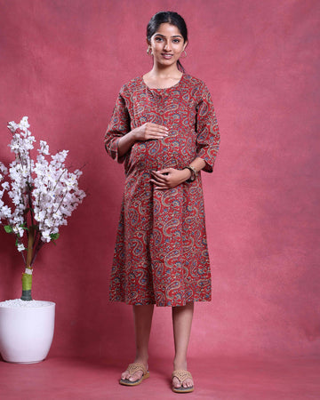 Women's paisley print maternity wear in red with three quarter sleeves and relaxed fit front view