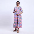 Women’s maternity wear dress with waist tie multicolor print short sleeves back view with relaxed fit