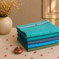 Multicolor Bengal Cotton Saree Collection With Contrast Borders And Woven Motifs Folded Stack View