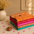 Bengal Cotton Saree Collection With Traditional Woven Motifs And Contrast Borders Folded Front View