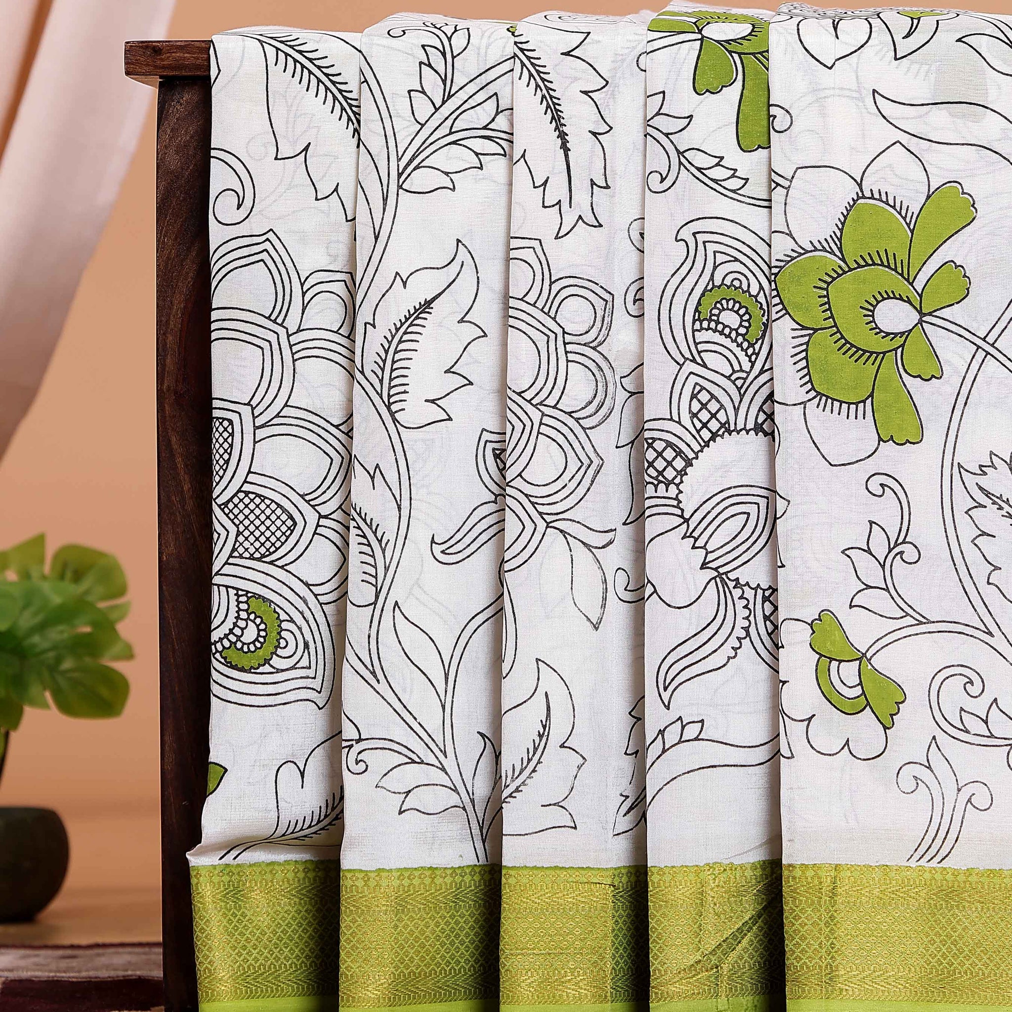 elegant-mangalagiri-semi-chanderi-saree-with-kalamkari-inspired-floral-motifs-and-a-contrast-zari-border-white-one