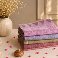 Bengal Cotton Saree Collection with Woven Motifs and Striped Borders in Assorted Pastel Colors Folded Display View