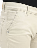men-mid-rise-slim-fit-clean-look-stretchable-jeans-beige-one