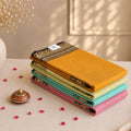 Assorted Mangalagiri Cotton Sarees In Mustard Yellow, Green, Aqua Blue And Pink Shades With Traditional Black Zari Borders